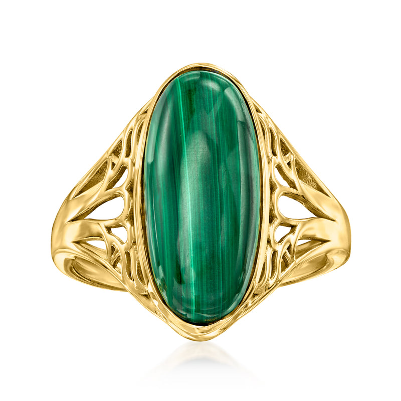 Malachite ring with oval green cabochon and ornate gold-tone filigree setting