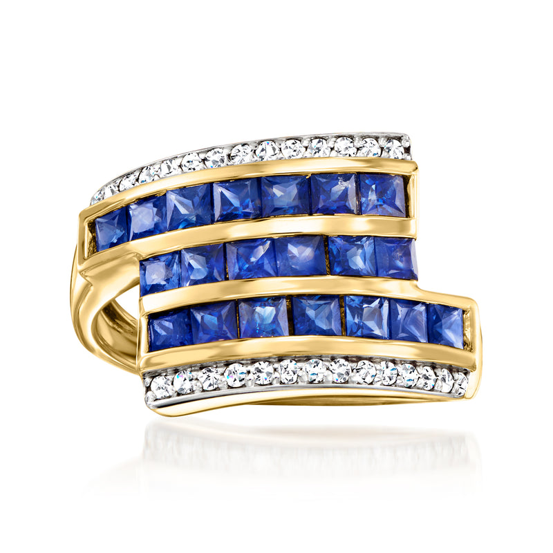 14kt yellow gold bypass ring with blue sapphire rows and diamond accents