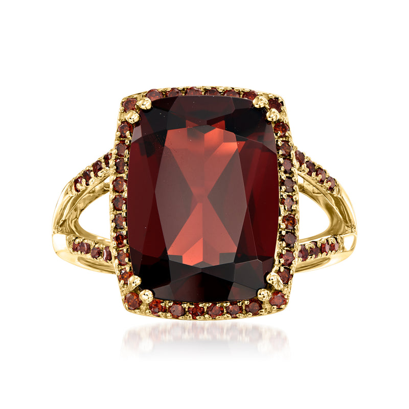 14kt yellow gold ring with cushion-cut dark red garnet center and red diamond halo