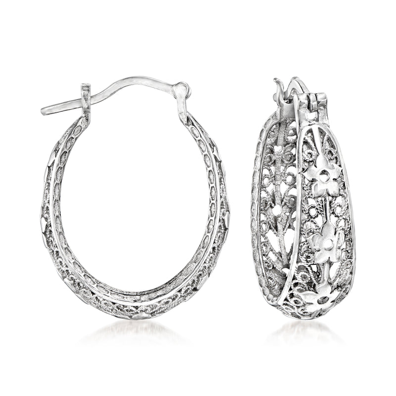 Sterling silver hoop earrings with floral filigree detail, textured oval wire frame