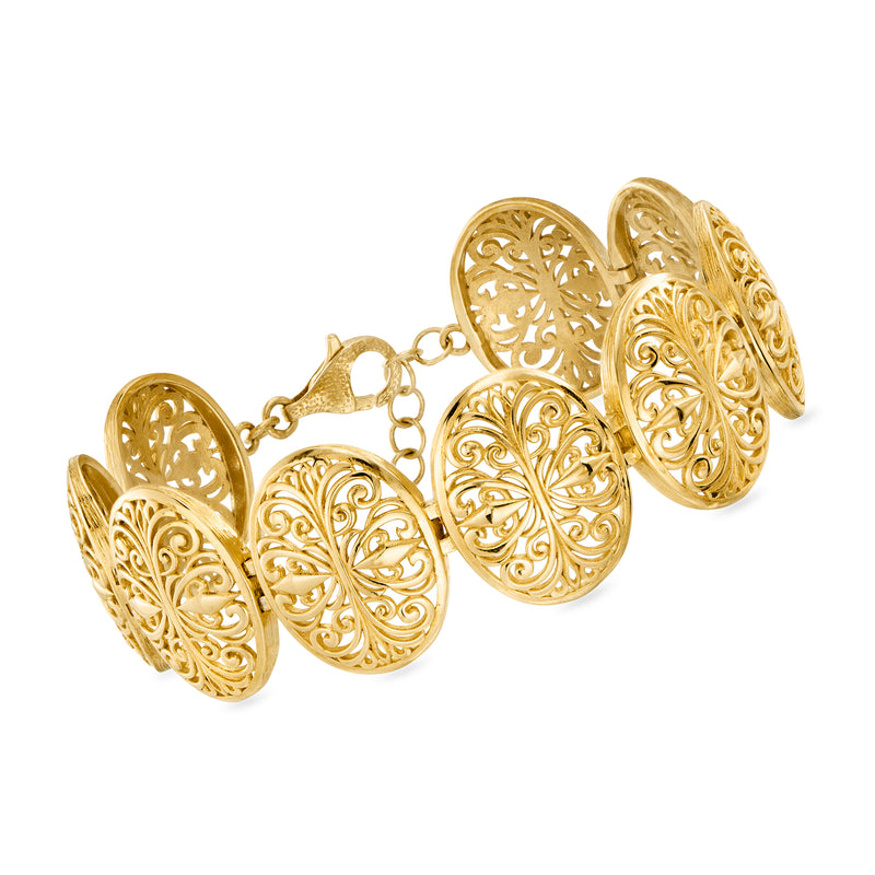 Gold over sterling bracelet with multi oval filigree scrollwork links and chain clasp