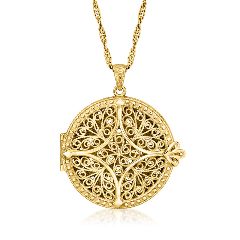 Round gold-tone filigree locket pendant on a cable chain necklace