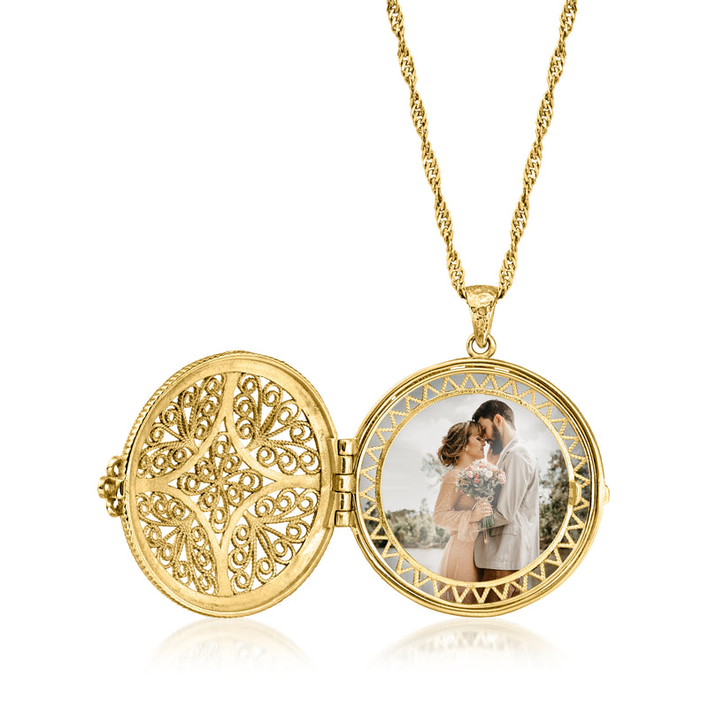 Gold-tone round locket necklace with open hinged faces and photo insert