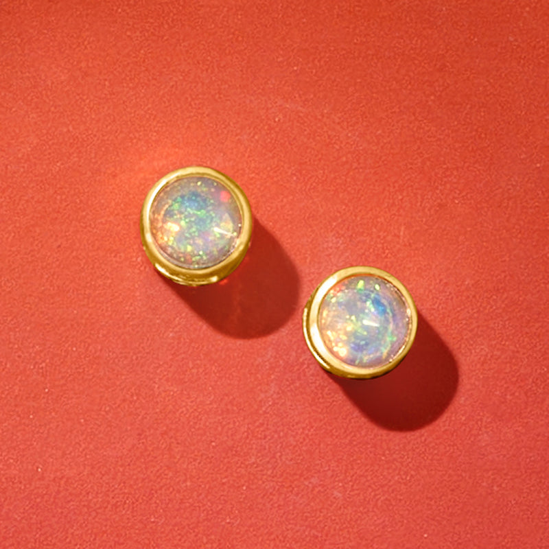 Round opal stud earrings, 14kt yellow gold setting with iridescent fire