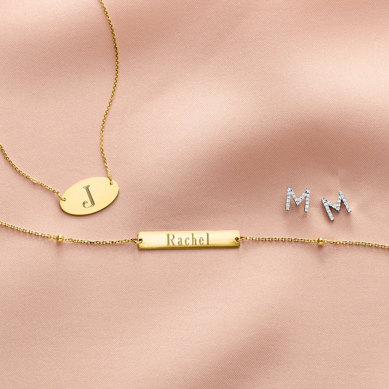14kt yellow gold ID bracelet with nameplate Rachel and round initial charm J