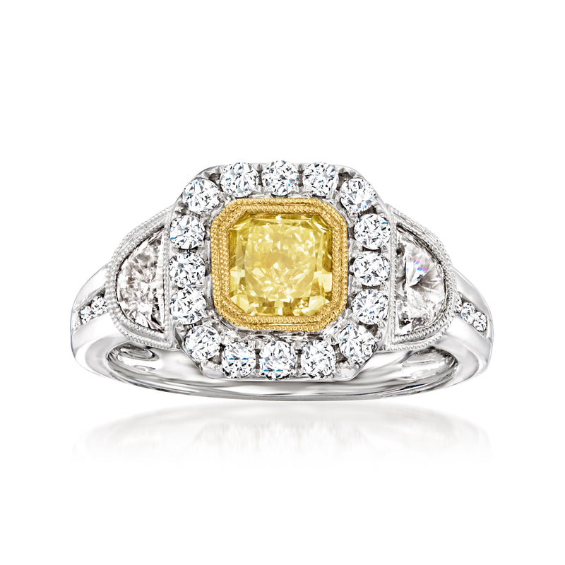 Two-tone gold diamond ring with yellow center stone and white halo