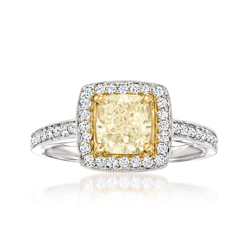 Two-tone gold ring with yellow center diamond and white diamond halo