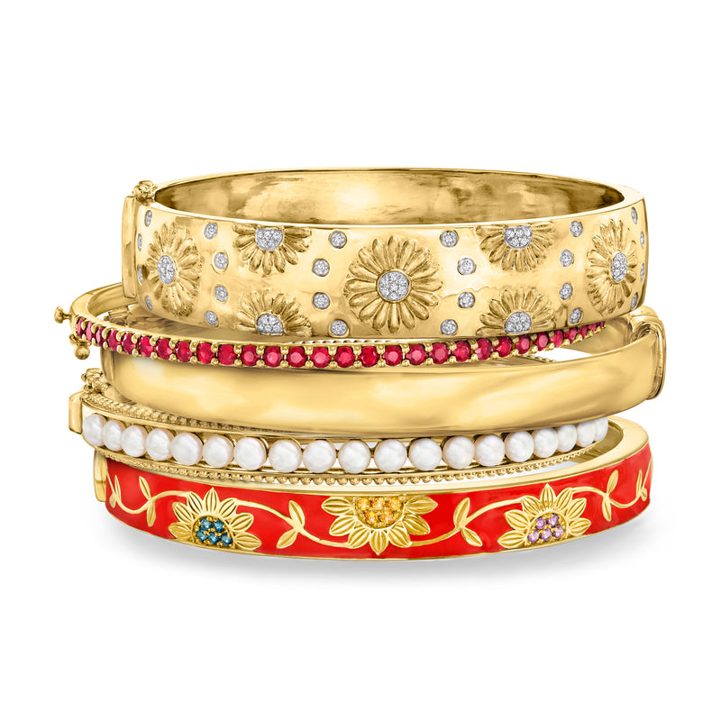 Set of five gold-tone bangle bracelets with botanical and gemstone accents
