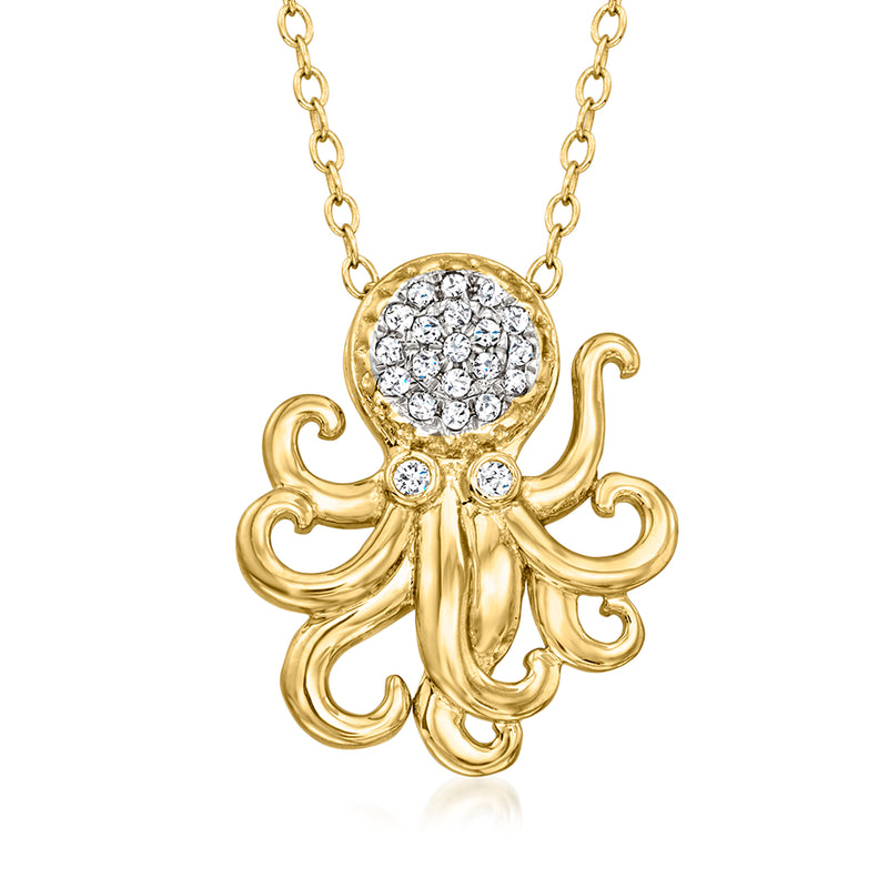 Gold-tone octopus pendant necklace with round diamond-look stones and linked chain.