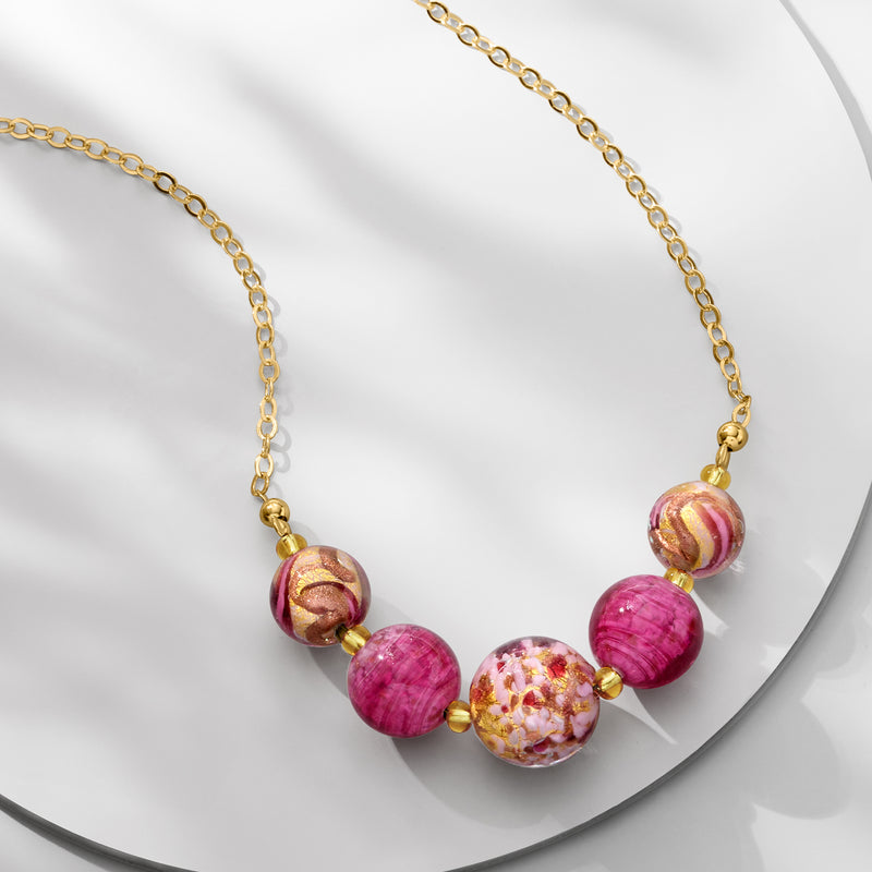 Gold chain Murano bead necklace with pink, magenta, and gold swirl beads