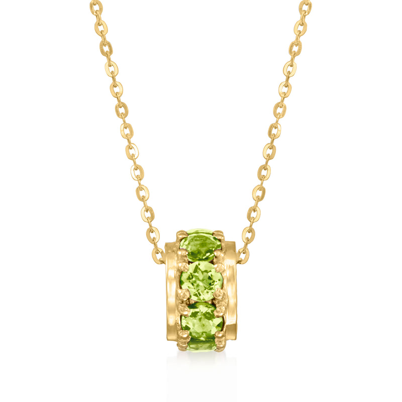 14kt yellow gold bead necklace with rectangular peridot centerpiece in prong setting