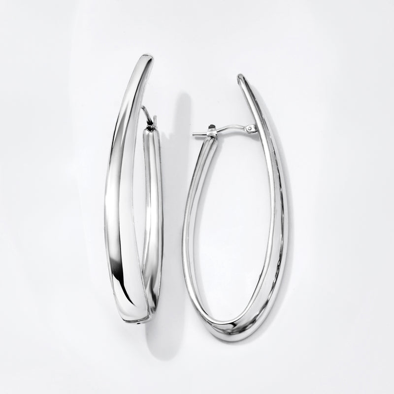 Sterling silver oval hoop earrings, glossy finish, side profile view