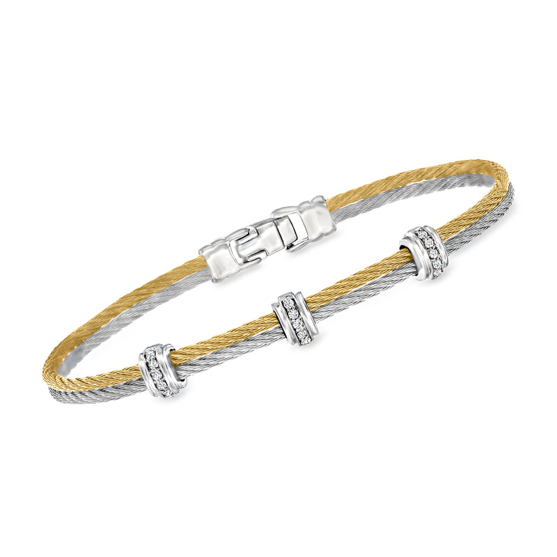 Two-tone cable bangle bracelet in yellow and silver with diamond-station accents