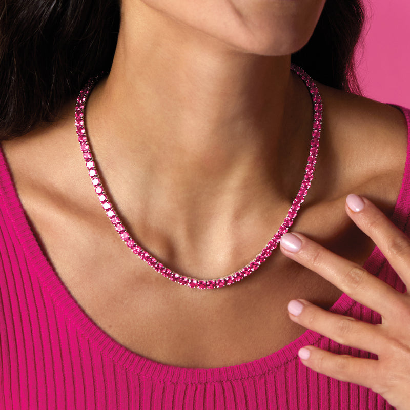 Pink topaz tennis necklace in sterling silver, round stones at the neckline