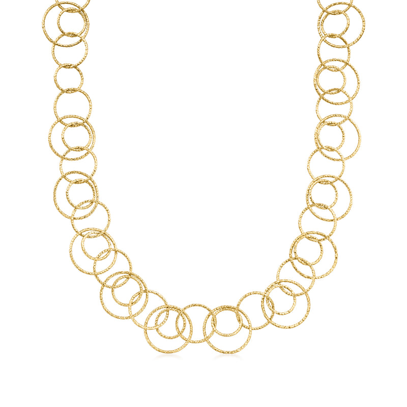 Gold over sterling multi-circle necklace with textured and polished ring links.