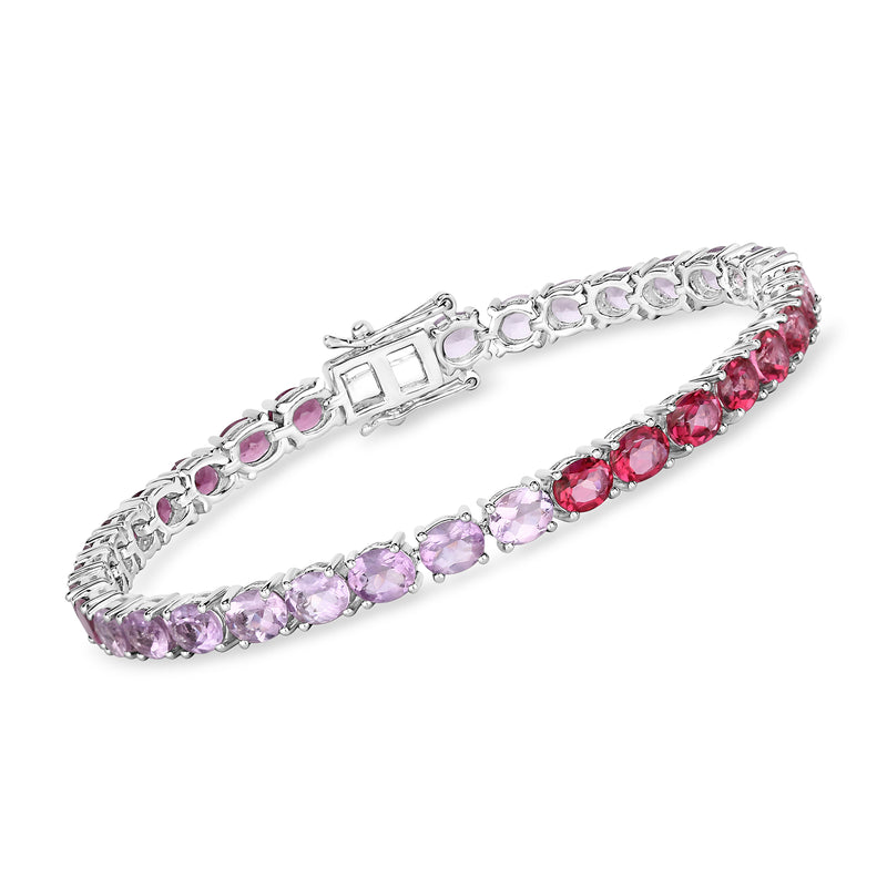 Sterling silver tennis bracelet with oval purple and red gemstones in a linked row