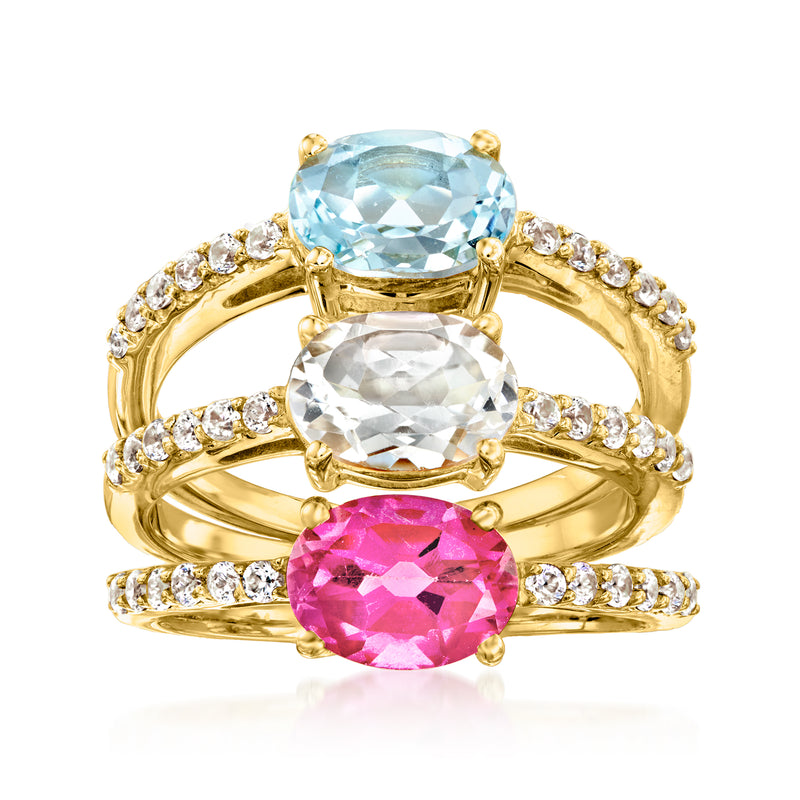 Three 18kt gold over sterling rings with oval blue, clear, and pink gemstones and white accents