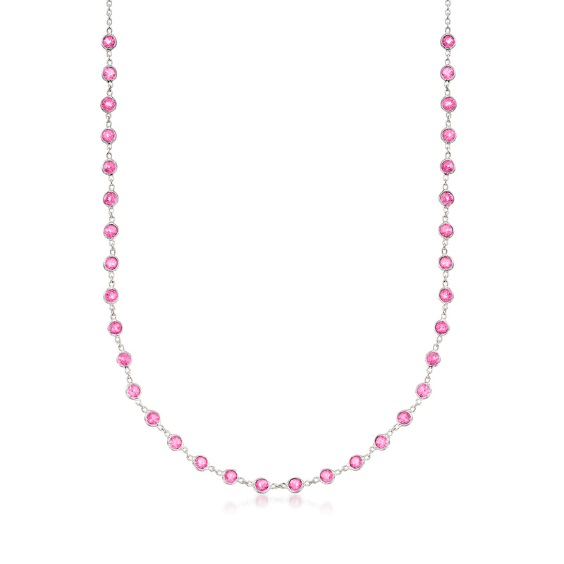 Sterling silver necklace with bezel-set pink topaz round stations