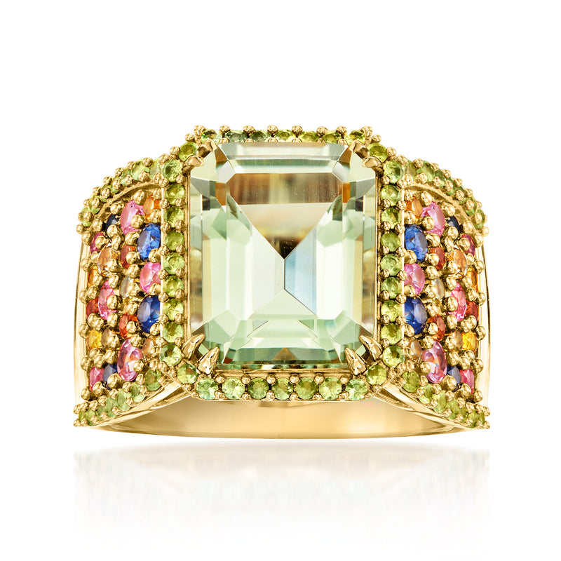 Gold ring with emerald-cut pale green prasiolite center and multicolor gemstone side clusters