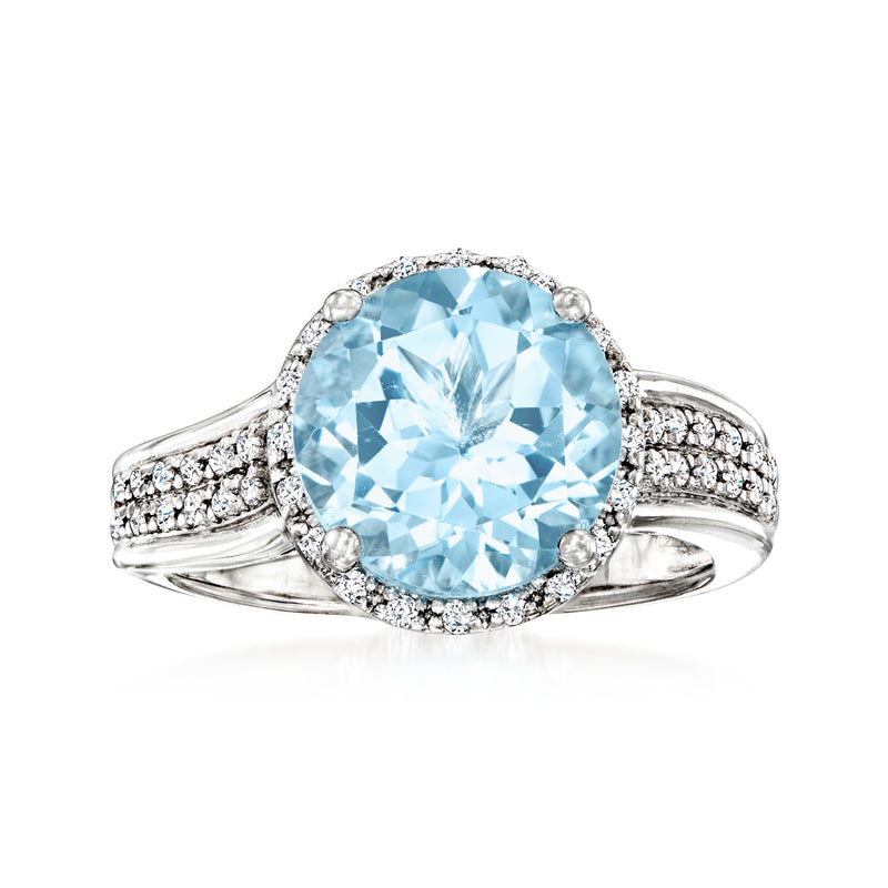 Sterling silver ring with sky blue topaz center and white topaz accents