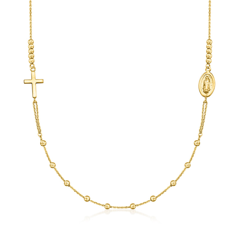 Yellow gold station necklace with cross charm and oval Virgin Mary medallion