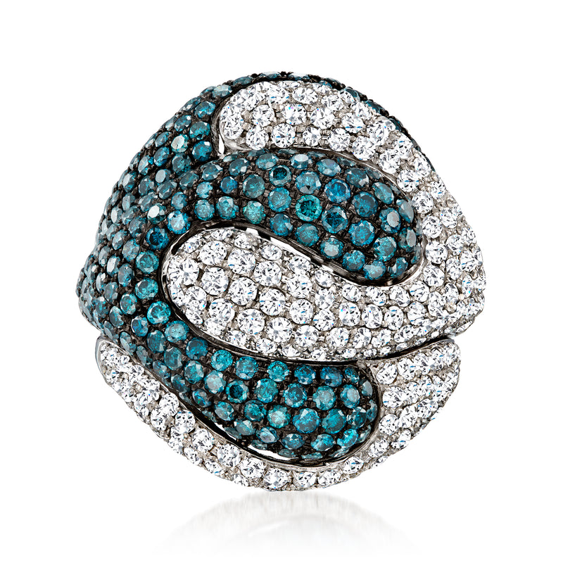 Wave diamond ring with blue and white stones, set in 18kt white gold