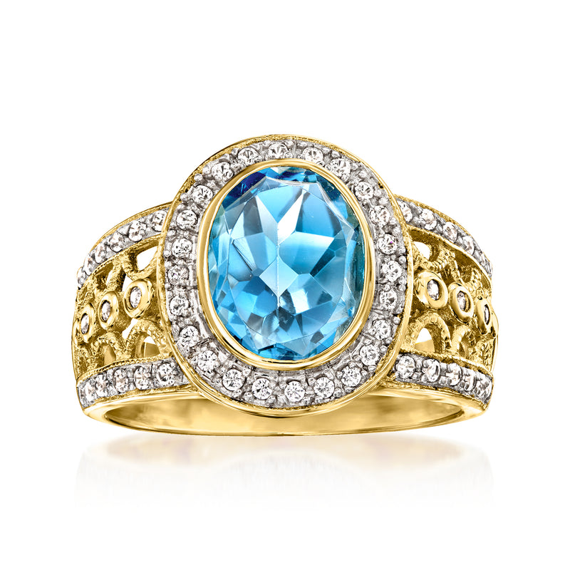 18kt gold over sterling ring with oval Swiss blue topaz center and white zircon halo
