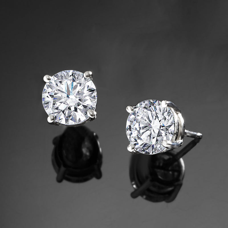 White gold lab-grown diamond stud earrings, round brilliant stones in 4-prong mount