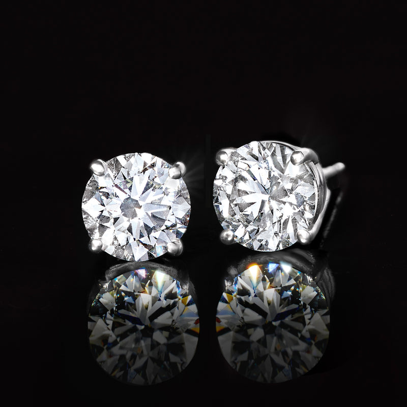 Round diamond stud earrings, bezel settings in 14kt white gold pair