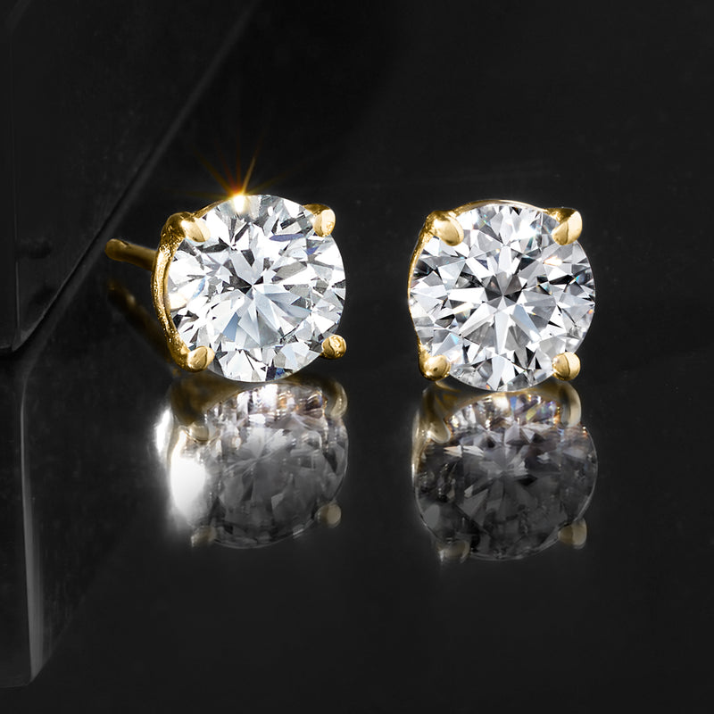 Round lab-grown diamond stud earrings in 14kt yellow gold, prong settings