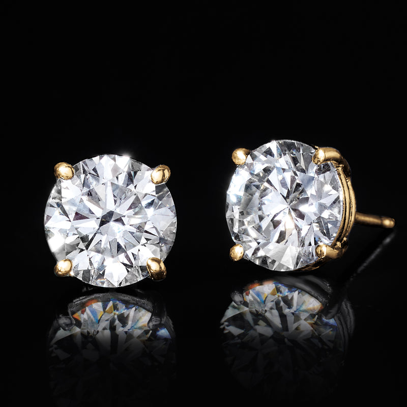 Round lab-grown diamond stud earrings in 14kt yellow gold, side view