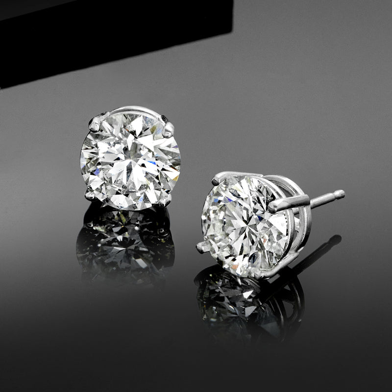 Round lab-grown diamond stud earrings in 14kt white gold, prong-set stones