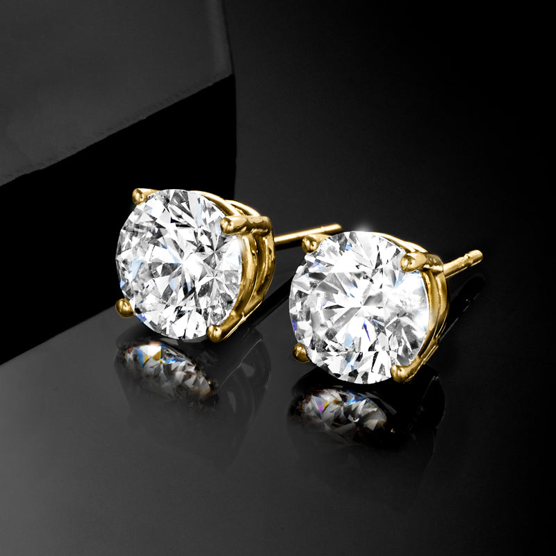 14kt yellow gold lab-grown diamond stud earrings, angled view showing bezel and posts