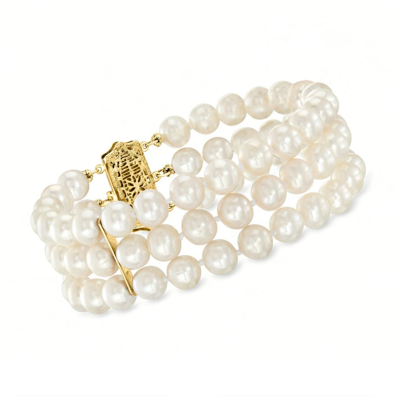 Three-row cultured pearl bracelet with 14kt yellow gold clasp and engraved charm