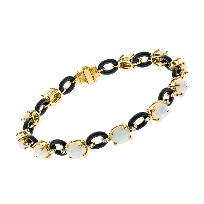 14kt yellow gold bracelet with black onyx, white opal-like stones, and diamond accents