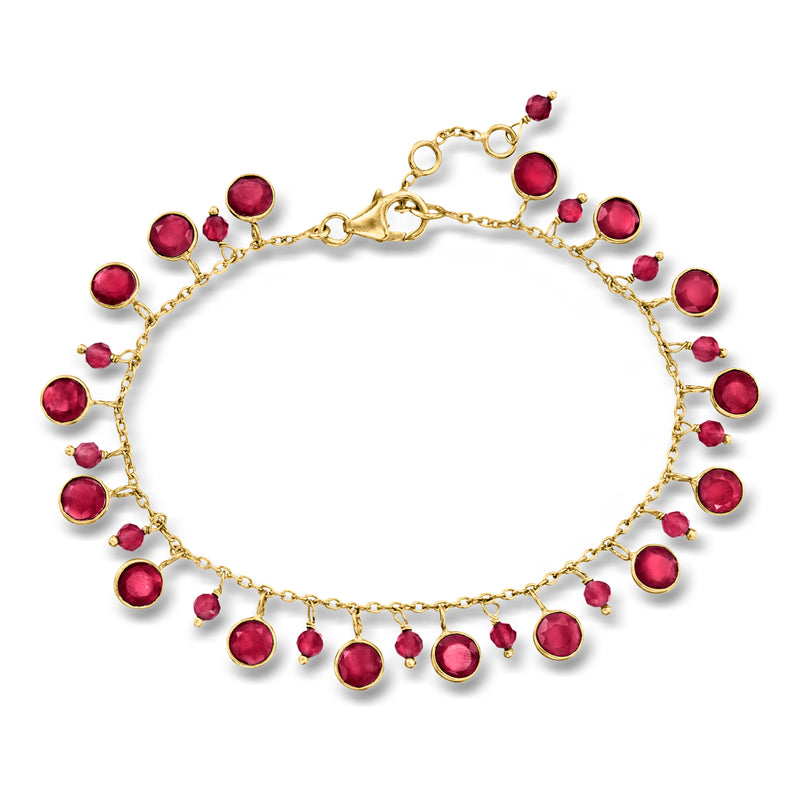 Gold ruby drop bracelet with round red gemstones on a chain and lobster clasp.