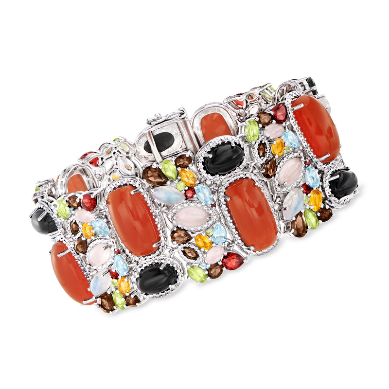 Sterling silver multi-gemstone bracelet with oval red, black, green and clear stones