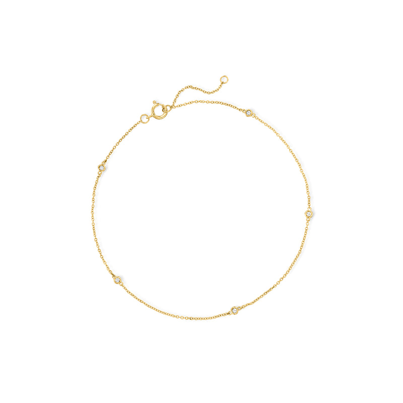 14kt yellow gold diamond station anklet with small round stones and spring clasp