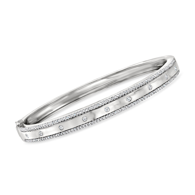 Sterling silver diamond-studded bangle bracelet with two rows of small round stones
