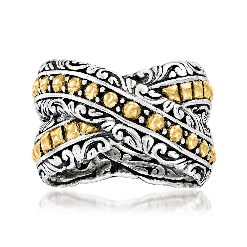 Bali-style crisscross ring in sterling silver with 18kt yellow gold bead and leaf accents