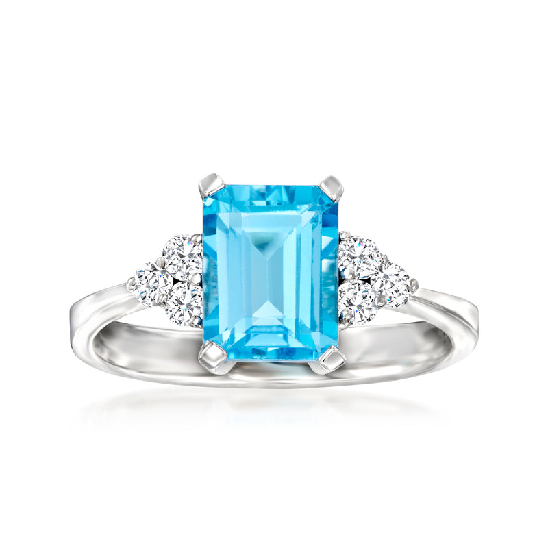 14kt white gold ring with rectangular Swiss blue topaz and diamond side stones