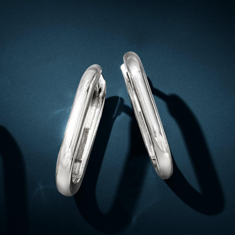 Polished sterling silver oval hoop earrings with paperclip link design