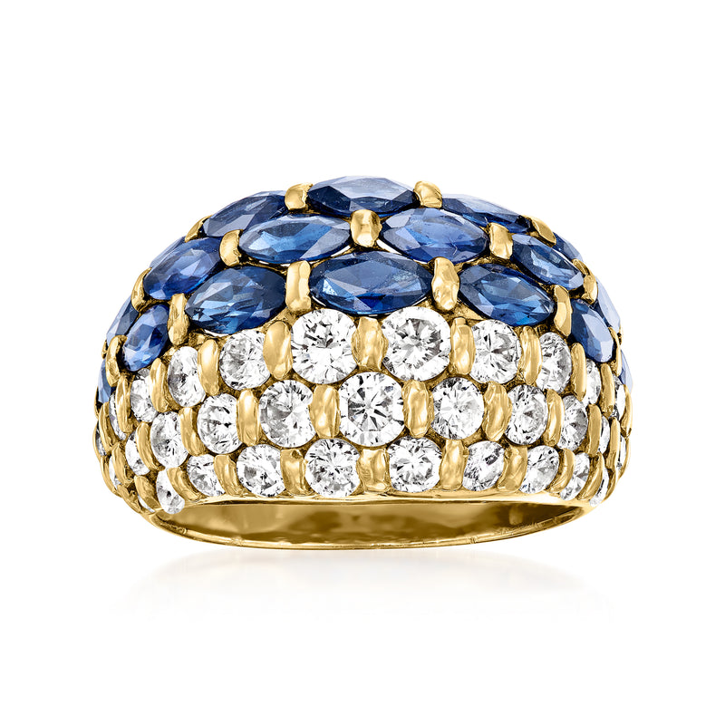 Vintage dome ring in yellow gold with blue sapphire top and round diamond rows