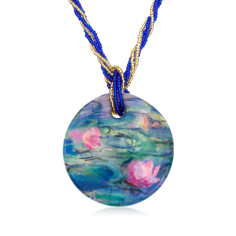 Murano glass pendant necklace with round blue and pink floral pendant on gold chain