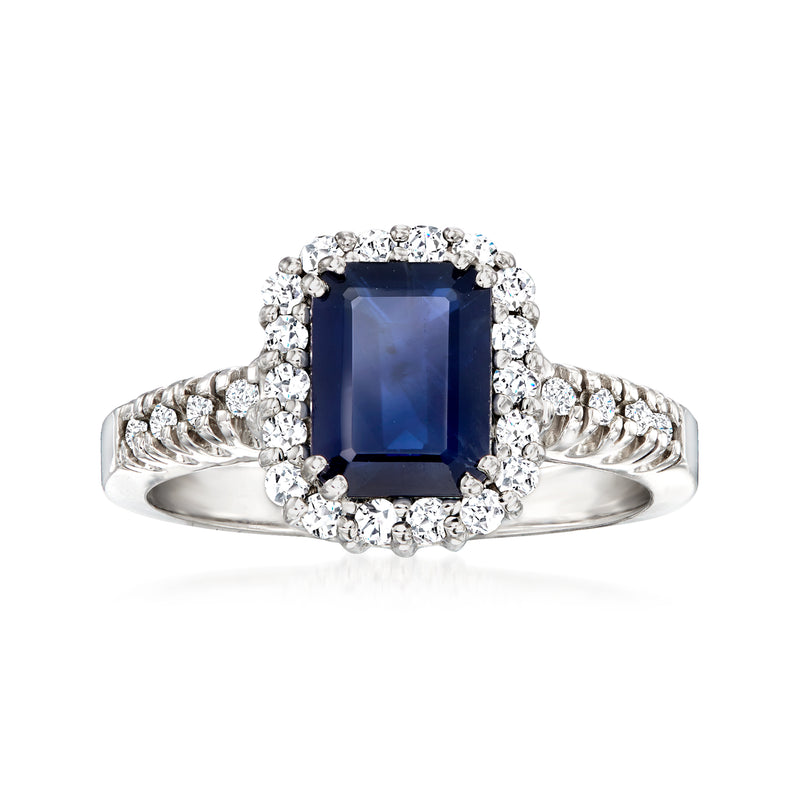 White gold sapphire ring with diamond halo and split-shank band