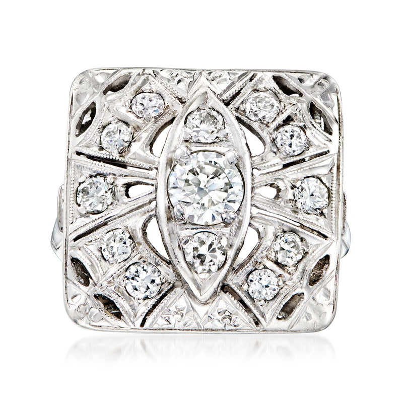 Vintage platinum diamond square ring with round center stone and openwork geometric setting
