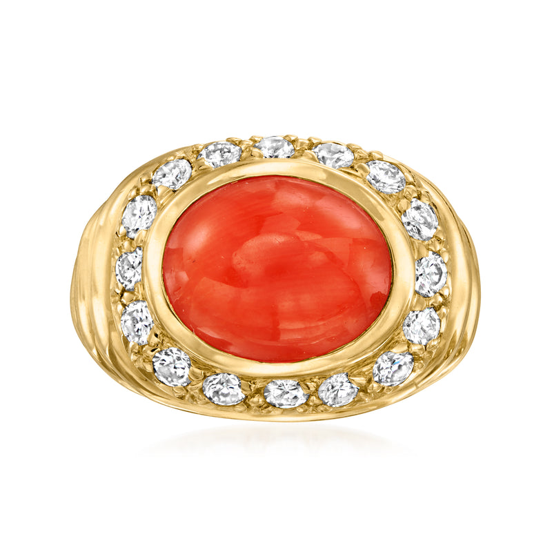 Vintage red coral oval ring with round diamond halo in 18kt yellow gold