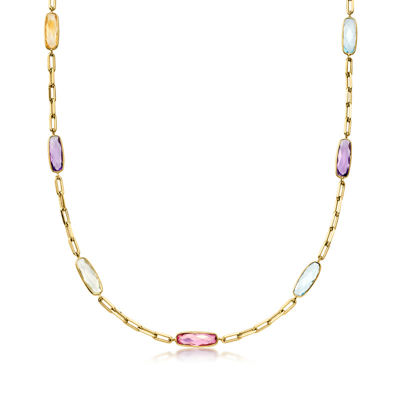 Gold tone paper-clip link necklace with oval pink, purple, blue, and white gemstones