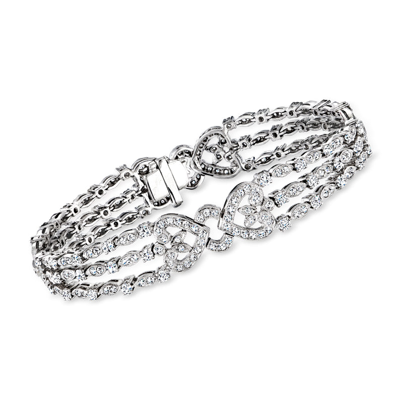 18k white gold diamond heart three-row bracelet with openwork hearts and hinged clasp