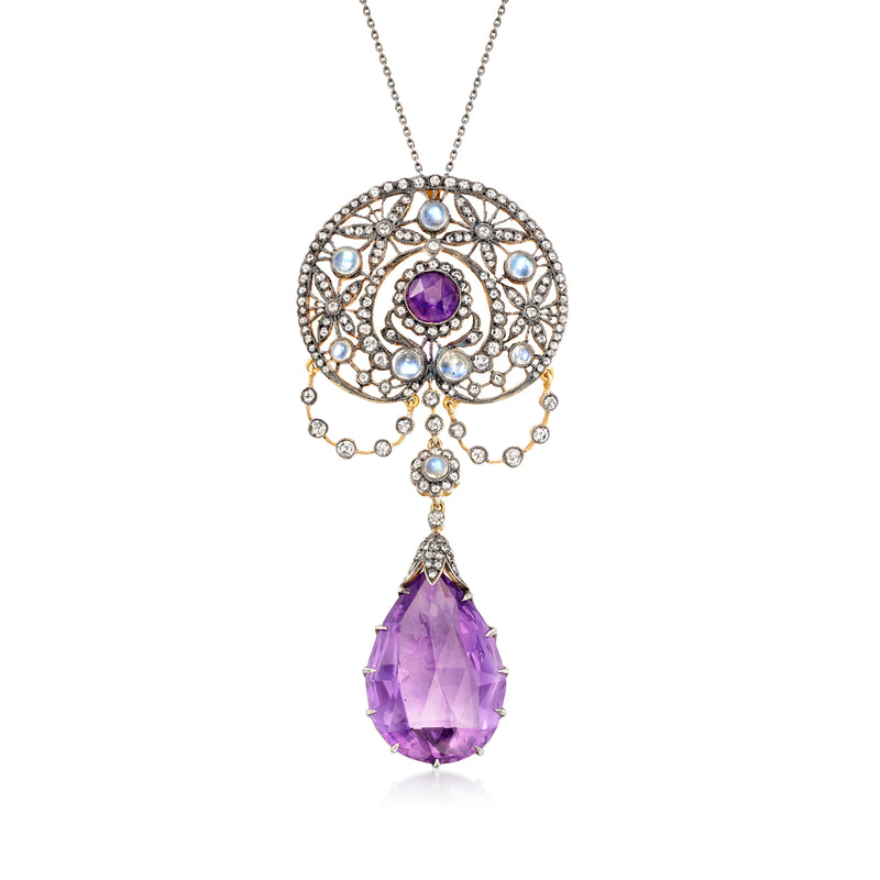 Two-tone sterling silver pendant necklace with ornate amethyst teardrop and moonstone accents